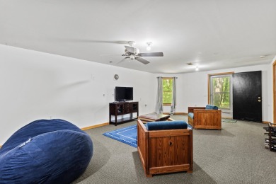 This beautiful Lake Mecosta property features 137 feet of nice on St. Ives Golf Club in Michigan - for sale on GolfHomes.com, golf home, golf lot