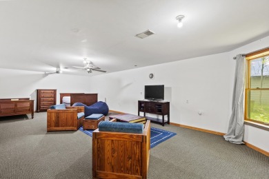 This beautiful Lake Mecosta property features 137 feet of nice on St. Ives Golf Club in Michigan - for sale on GolfHomes.com, golf home, golf lot