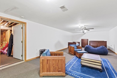 This beautiful Lake Mecosta property features 137 feet of nice on St. Ives Golf Club in Michigan - for sale on GolfHomes.com, golf home, golf lot