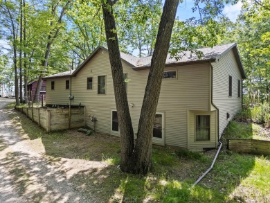 This beautiful Lake Mecosta property features 137 feet of nice on St. Ives Golf Club in Michigan - for sale on GolfHomes.com, golf home, golf lot