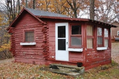 This beautiful Lake Mecosta property features 137 feet of nice on St. Ives Golf Club in Michigan - for sale on GolfHomes.com, golf home, golf lot