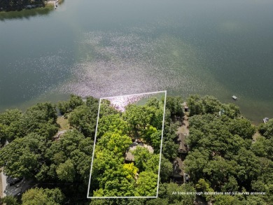 This beautiful Lake Mecosta property features 137 feet of nice on St. Ives Golf Club in Michigan - for sale on GolfHomes.com, golf home, golf lot