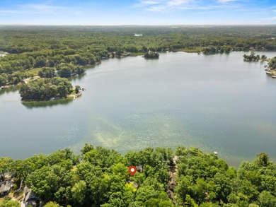 This beautiful Lake Mecosta property features 137 feet of nice on St. Ives Golf Club in Michigan - for sale on GolfHomes.com, golf home, golf lot