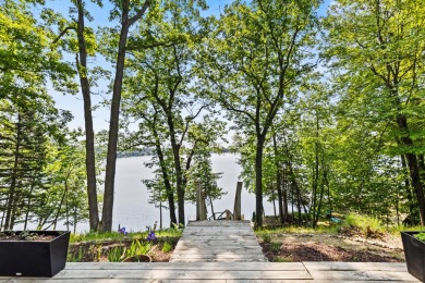 This beautiful Lake Mecosta property features 137 feet of nice on St. Ives Golf Club in Michigan - for sale on GolfHomes.com, golf home, golf lot