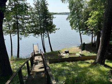 This beautiful Lake Mecosta property features 137 feet of nice on St. Ives Golf Club in Michigan - for sale on GolfHomes.com, golf home, golf lot