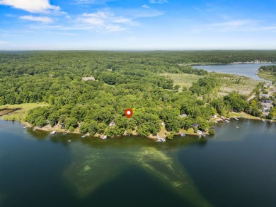 This beautiful Lake Mecosta property features 137 feet of nice on St. Ives Golf Club in Michigan - for sale on GolfHomes.com, golf home, golf lot