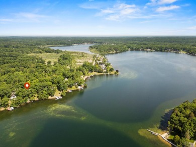 This beautiful Lake Mecosta property features 137 feet of nice on St. Ives Golf Club in Michigan - for sale on GolfHomes.com, golf home, golf lot