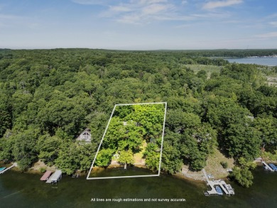 This beautiful Lake Mecosta property features 137 feet of nice on St. Ives Golf Club in Michigan - for sale on GolfHomes.com, golf home, golf lot