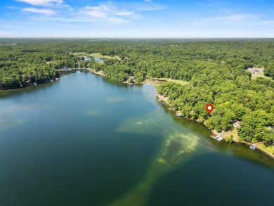 This beautiful Lake Mecosta property features 137 feet of nice on St. Ives Golf Club in Michigan - for sale on GolfHomes.com, golf home, golf lot