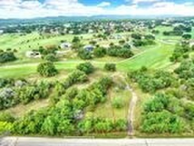 Discover the perfect blend of nature and community at Lot 12 on Flying L Guest Ranch in Texas - for sale on GolfHomes.com, golf home, golf lot