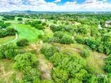 Discover the perfect blend of nature and community at Lot 12 on Flying L Guest Ranch in Texas - for sale on GolfHomes.com, golf home, golf lot