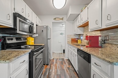 This beautifully renovated Villa is perfectly placed in Seascape on Seascape Golf Course in Florida - for sale on GolfHomes.com, golf home, golf lot