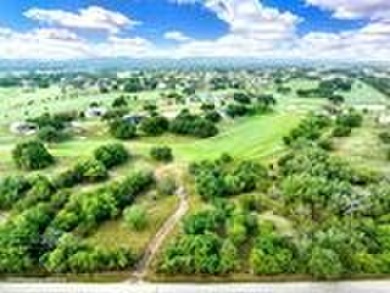 Discover the perfect blend of nature and community at Lot 12 on Flying L Guest Ranch in Texas - for sale on GolfHomes.com, golf home, golf lot