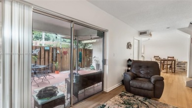 Discover this charming townhouse with 3 spacious bedrooms and 3 on Pine Island Ridge Country Club in Florida - for sale on GolfHomes.com, golf home, golf lot