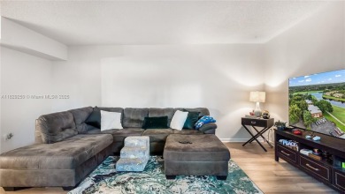 Discover this charming townhouse with 3 spacious bedrooms and 3 on Pine Island Ridge Country Club in Florida - for sale on GolfHomes.com, golf home, golf lot
