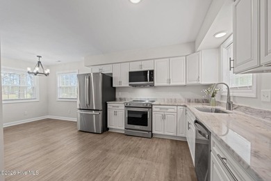 Move right into this beautifully renovated 3 bedroom, 2 bathroom on River Bend Golf and Country Club in North Carolina - for sale on GolfHomes.com, golf home, golf lot