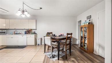 Discover this charming townhouse with 3 spacious bedrooms and 3 on Pine Island Ridge Country Club in Florida - for sale on GolfHomes.com, golf home, golf lot