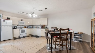 Discover this charming townhouse with 3 spacious bedrooms and 3 on Pine Island Ridge Country Club in Florida - for sale on GolfHomes.com, golf home, golf lot