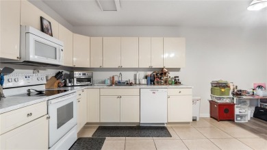 Discover this charming townhouse with 3 spacious bedrooms and 3 on Pine Island Ridge Country Club in Florida - for sale on GolfHomes.com, golf home, golf lot