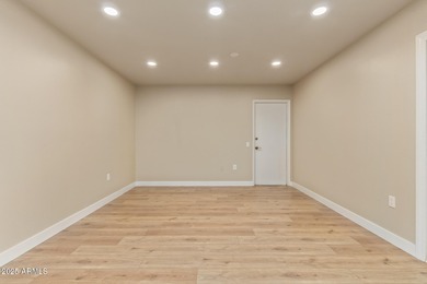 This stunning Sun City residence has been fully remodeled and is on Sun City Lakes West and East in Arizona - for sale on GolfHomes.com, golf home, golf lot