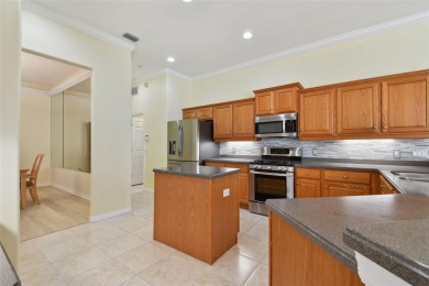If you are looking for a spacious, well-maintained pool home in on Links At Greenfield Plantation in Florida - for sale on GolfHomes.com, golf home, golf lot