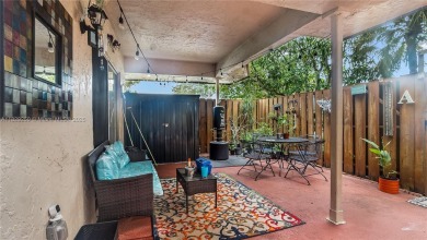 Discover this charming townhouse with 3 spacious bedrooms and 3 on Pine Island Ridge Country Club in Florida - for sale on GolfHomes.com, golf home, golf lot