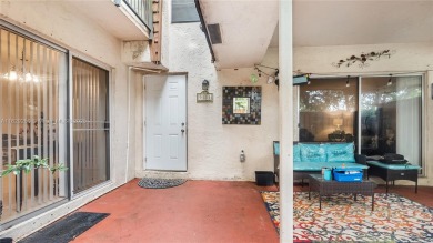 Discover this charming townhouse with 3 spacious bedrooms and 3 on Pine Island Ridge Country Club in Florida - for sale on GolfHomes.com, golf home, golf lot