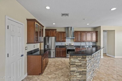 Experience resort-style living in Verrado! This beautifully on Verrado Golf Club  in Arizona - for sale on GolfHomes.com, golf home, golf lot