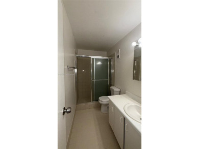 Discover this charming townhouse with 3 spacious bedrooms and 3 on Pine Island Ridge Country Club in Florida - for sale on GolfHomes.com, golf home, golf lot