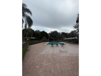 Discover this charming townhouse with 3 spacious bedrooms and 3 on Pine Island Ridge Country Club in Florida - for sale on GolfHomes.com, golf home, golf lot
