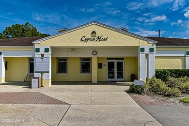 Located in the desirable Cypress Head community, this on The Golf Club At Cypress Head in Florida - for sale on GolfHomes.com, golf home, golf lot