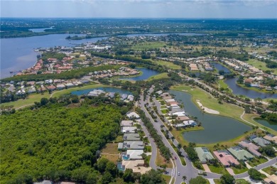 NEW ROOF! 2 New A/c units. Three bedrooms and office with 3 on Santa Lucia River Club in Florida - for sale on GolfHomes.com, golf home, golf lot