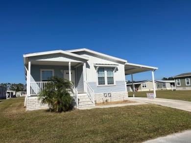 TWO YEAR OLD CONSTRUCTION! TAKE A LOOK AT THIS 2022 MODEL WITH on The Links of Lake Bernadette in Florida - for sale on GolfHomes.com, golf home, golf lot