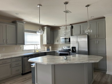 TWO YEAR OLD CONSTRUCTION! TAKE A LOOK AT THIS 2022 MODEL WITH on The Links of Lake Bernadette in Florida - for sale on GolfHomes.com, golf home, golf lot