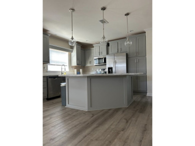 TWO YEAR OLD CONSTRUCTION! TAKE A LOOK AT THIS 2022 MODEL WITH on The Links of Lake Bernadette in Florida - for sale on GolfHomes.com, golf home, golf lot