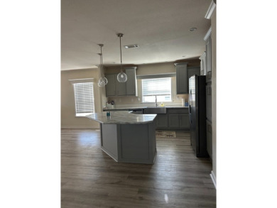 TWO YEAR OLD CONSTRUCTION! TAKE A LOOK AT THIS 2022 MODEL WITH on The Links of Lake Bernadette in Florida - for sale on GolfHomes.com, golf home, golf lot
