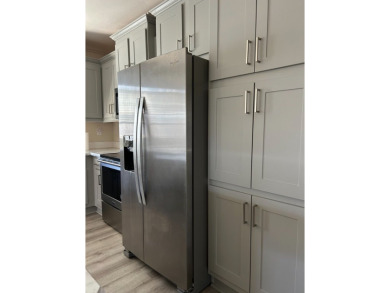 TWO YEAR OLD CONSTRUCTION! TAKE A LOOK AT THIS 2022 MODEL WITH on The Links of Lake Bernadette in Florida - for sale on GolfHomes.com, golf home, golf lot