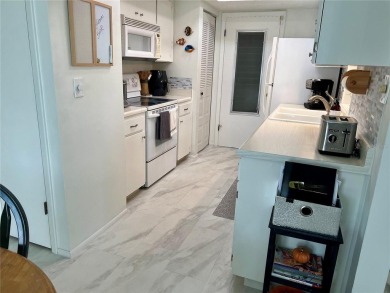 Enjoy the LOWER HOA fees with this Light and Bright, spacious on Highland Lakes Executive Golf Course in Florida - for sale on GolfHomes.com, golf home, golf lot
