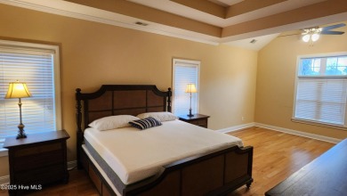 Step into this elegant 2900+ square foot home that combines on Brunswick Plantation and Golf Resorts in North Carolina - for sale on GolfHomes.com, golf home, golf lot