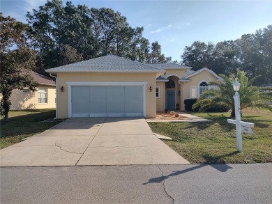 WHAT A RARE FIND!!! This Caneel Bay model home is an example of on Royal Oaks Golf Club in Florida - for sale on GolfHomes.com, golf home, golf lot