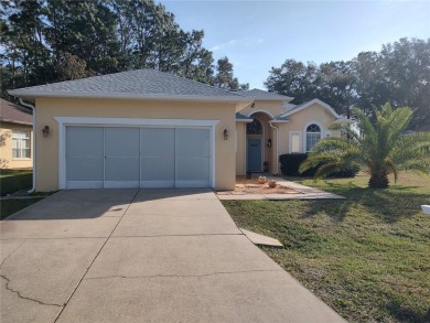 WHAT A RARE FIND!!! This Caneel Bay model home is an example of on Royal Oaks Golf Club in Florida - for sale on GolfHomes.com, golf home, golf lot