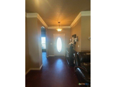 This stunning 4 bedroom, 2 bath home with a sparkling pool is on Gatesville Country Club in Texas - for sale on GolfHomes.com, golf home, golf lot