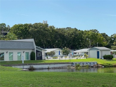 Enjoy the LOWER HOA fees with this Light and Bright, spacious on Highland Lakes Executive Golf Course in Florida - for sale on GolfHomes.com, golf home, golf lot