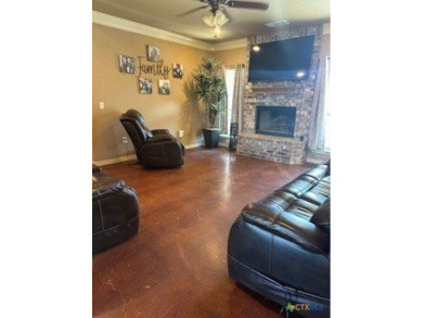 This stunning 4 bedroom, 2 bath home with a sparkling pool is on Gatesville Country Club in Texas - for sale on GolfHomes.com, golf home, golf lot