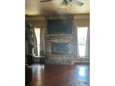 This stunning 4 bedroom, 2 bath home with a sparkling pool is on Gatesville Country Club in Texas - for sale on GolfHomes.com, golf home, golf lot