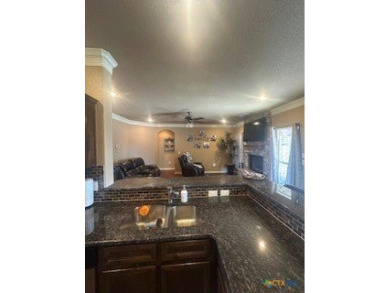 This stunning 4 bedroom, 2 bath home with a sparkling pool is on Gatesville Country Club in Texas - for sale on GolfHomes.com, golf home, golf lot