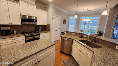 Step into this elegant 2900+ square foot home that combines on Brunswick Plantation and Golf Resorts in North Carolina - for sale on GolfHomes.com, golf home, golf lot