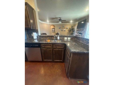 This stunning 4 bedroom, 2 bath home with a sparkling pool is on Gatesville Country Club in Texas - for sale on GolfHomes.com, golf home, golf lot