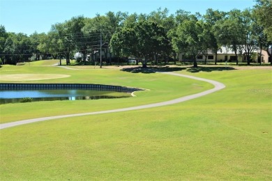 Enjoy the LOWER HOA fees with this Light and Bright, spacious on Highland Lakes Executive Golf Course in Florida - for sale on GolfHomes.com, golf home, golf lot