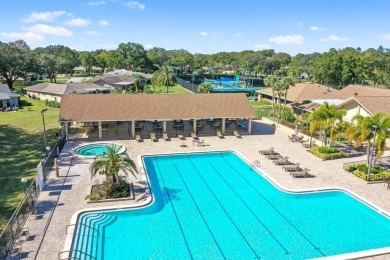 Enjoy the LOWER HOA fees with this Light and Bright, spacious on Highland Lakes Executive Golf Course in Florida - for sale on GolfHomes.com, golf home, golf lot